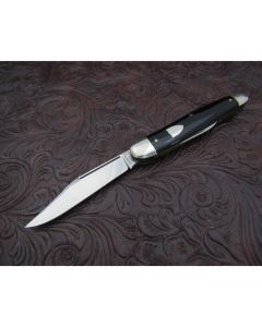 Antique Schrade Cut Co. salesman sample serpentine jack knife 3.625 inch mint condition with slick black acrylic handles and carbon steel blade with plain blade edges