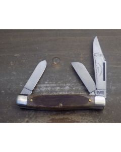 Original Colonel Coon large stockman knife 3.938 inches mint condition with Beautiful brown saw cut bone handles and carbon steel blades with plain blade edge