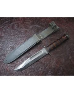 Antique WWII era Ka-Bar USN MK2 fighting knife unused condition with leather stack handle 6.938 inch carbon steel blade with plain blade edge