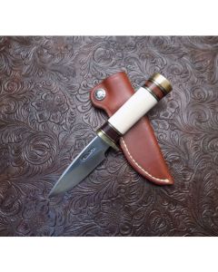 Randall Made Knives model 25 Mini serial number 1393 with 3 ½” inch stainless steel blade standard single hilt with interior cut fossilized Mammoth ivory handle with leather and brass