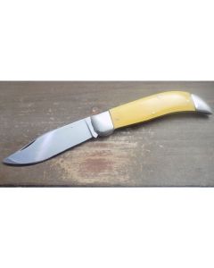 Antique Case XX Tested era 1920-1939 clasp knife 4.313 inch near mint condition with durable yellow composition handles and carbon steel blade with plain blade edge