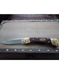 Buck 50th Anniversary Brian Yellowhorse Custom 110 Folding Hunter with Dymondwood Handles and Satin 420 Stainless Steel 3.75” Clip Point Plain Edge Blades