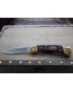 Buck 50th Anniversary Brian Yellowhorse Custom 110 Folding Hunter with Dymondwood Handles and Satin 420 Stainless Steel 3.75” Clip Point Plain Edge Blades